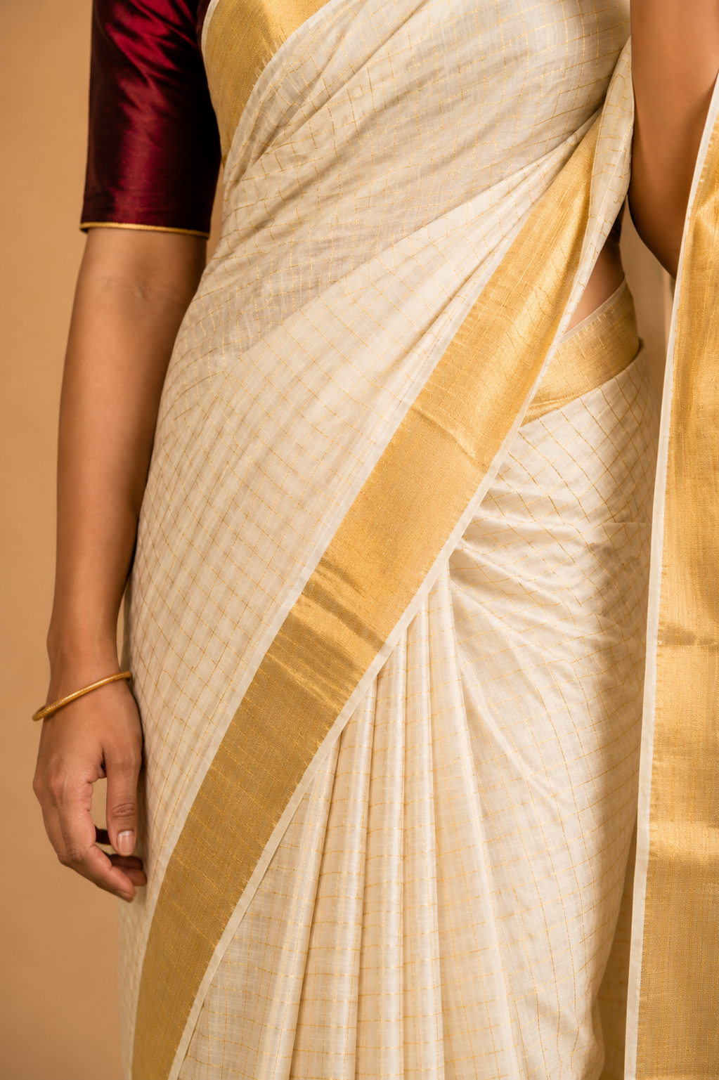 Svarna – Golden Checked Kasavu Saree